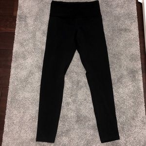 Tuff Athletics black leggings with back zippered pocket size small